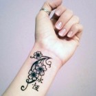 Tattoo For Women On Wrist Flowers Pictures